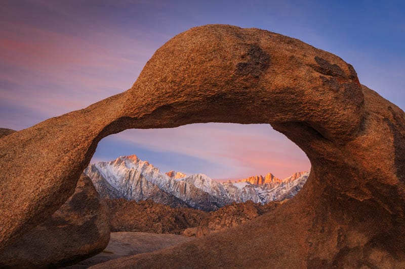 Mobius Arch in the Alabama Hills in California frames Mount Whitney
